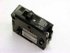 A Full Size 15 Amp Circuit Breaker